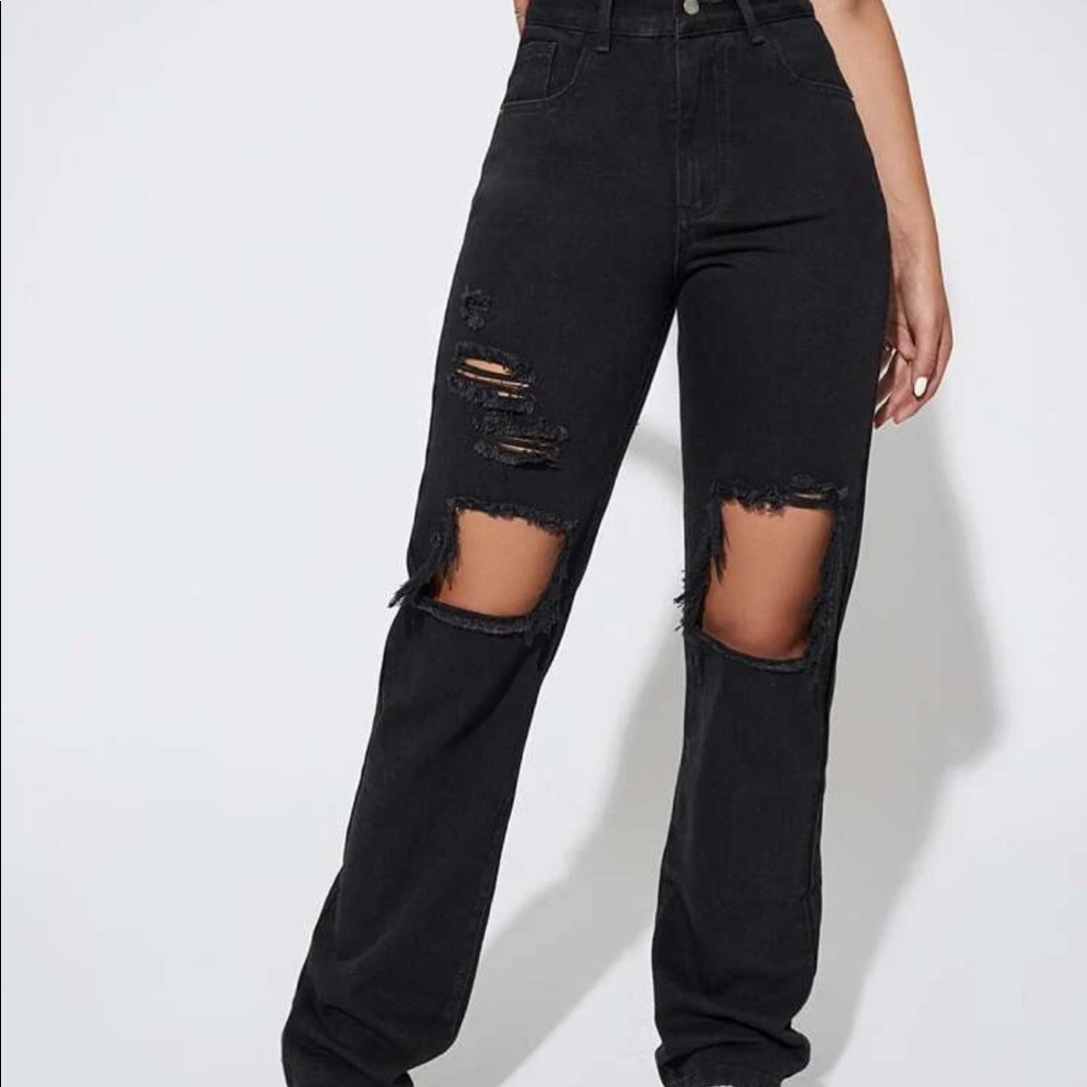 High waisted light washed destroyed boyfriend jeans